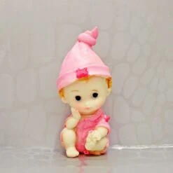 Babybeeldje Zittend Roze (4st)